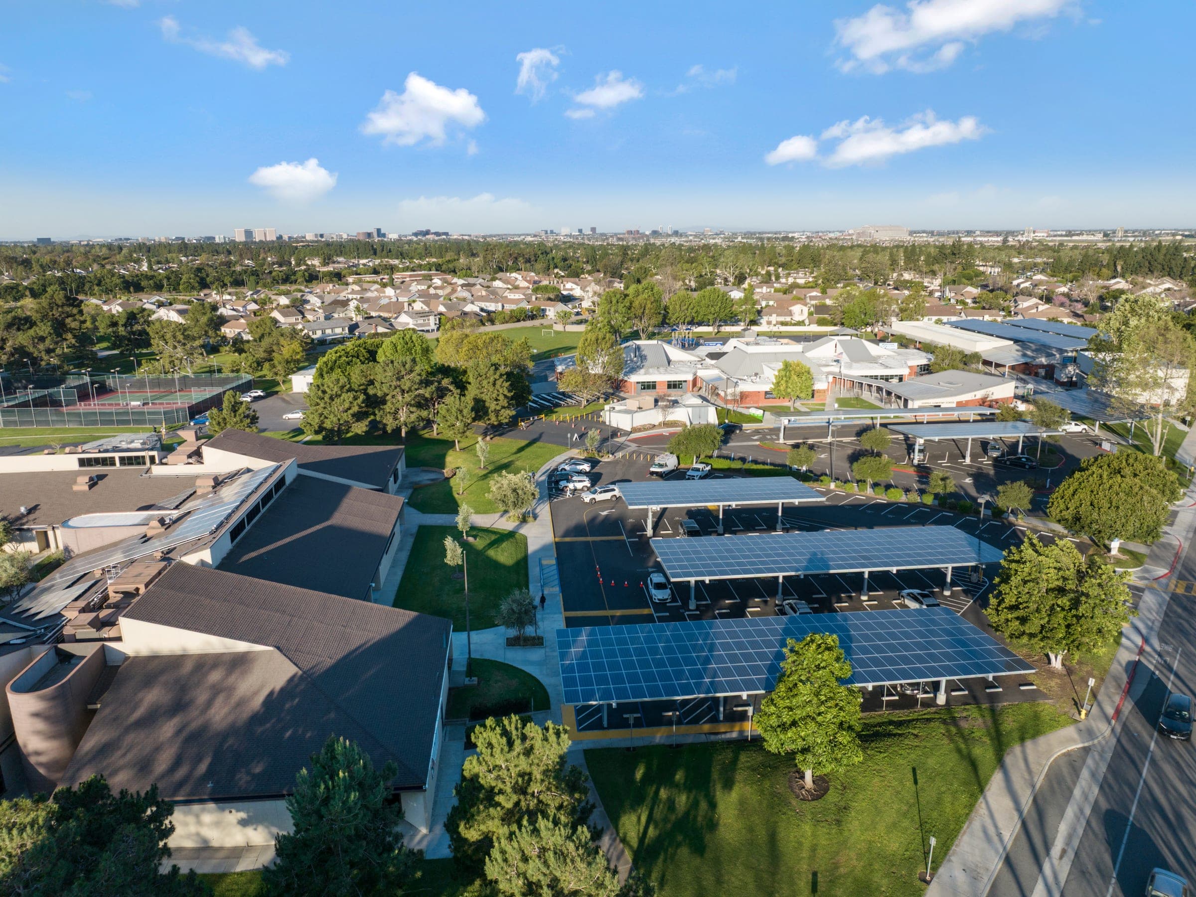 Aerial view of rooftop solar array grid-tied in San Diego