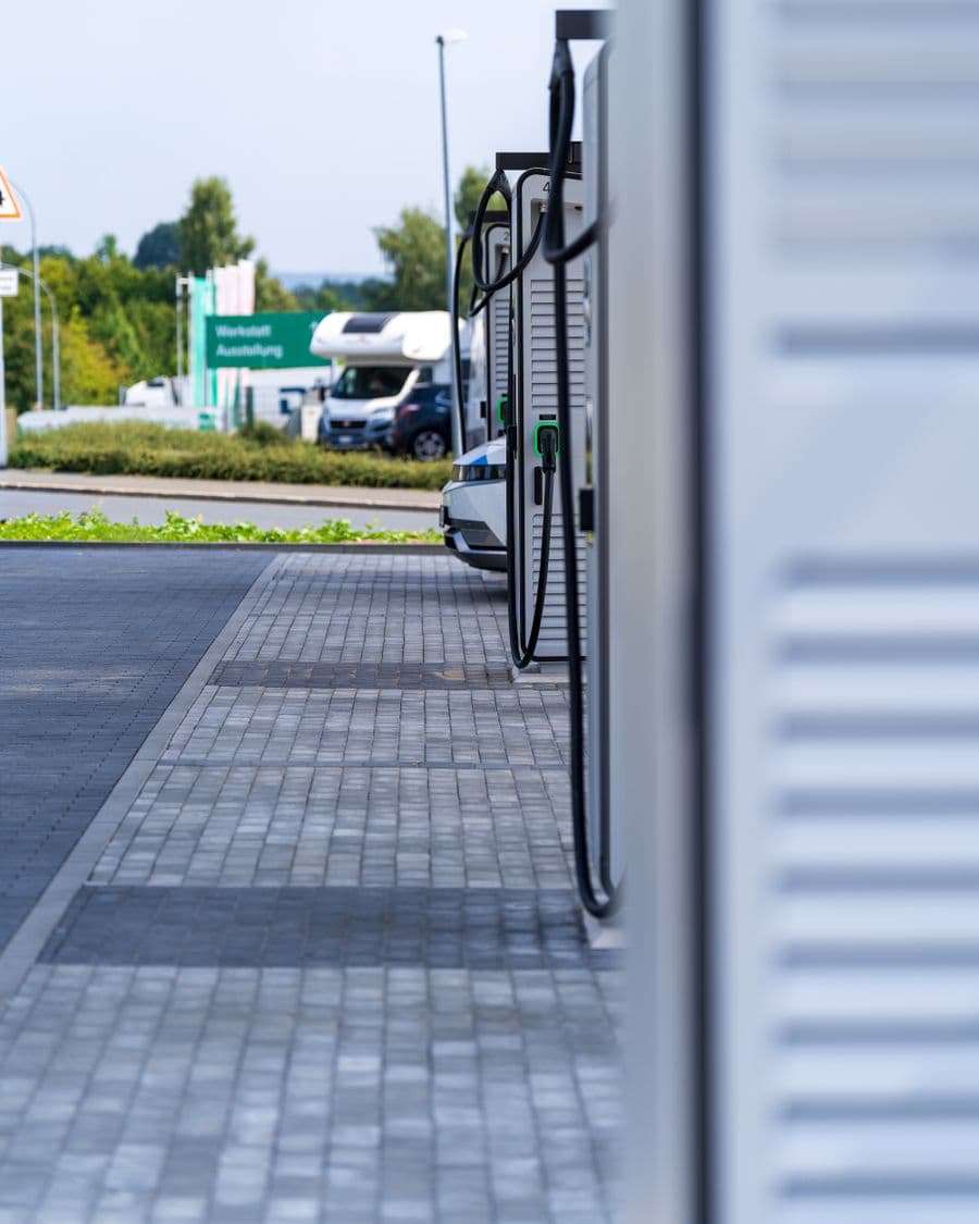 Solar carport canopy over a parking lot with EV charging