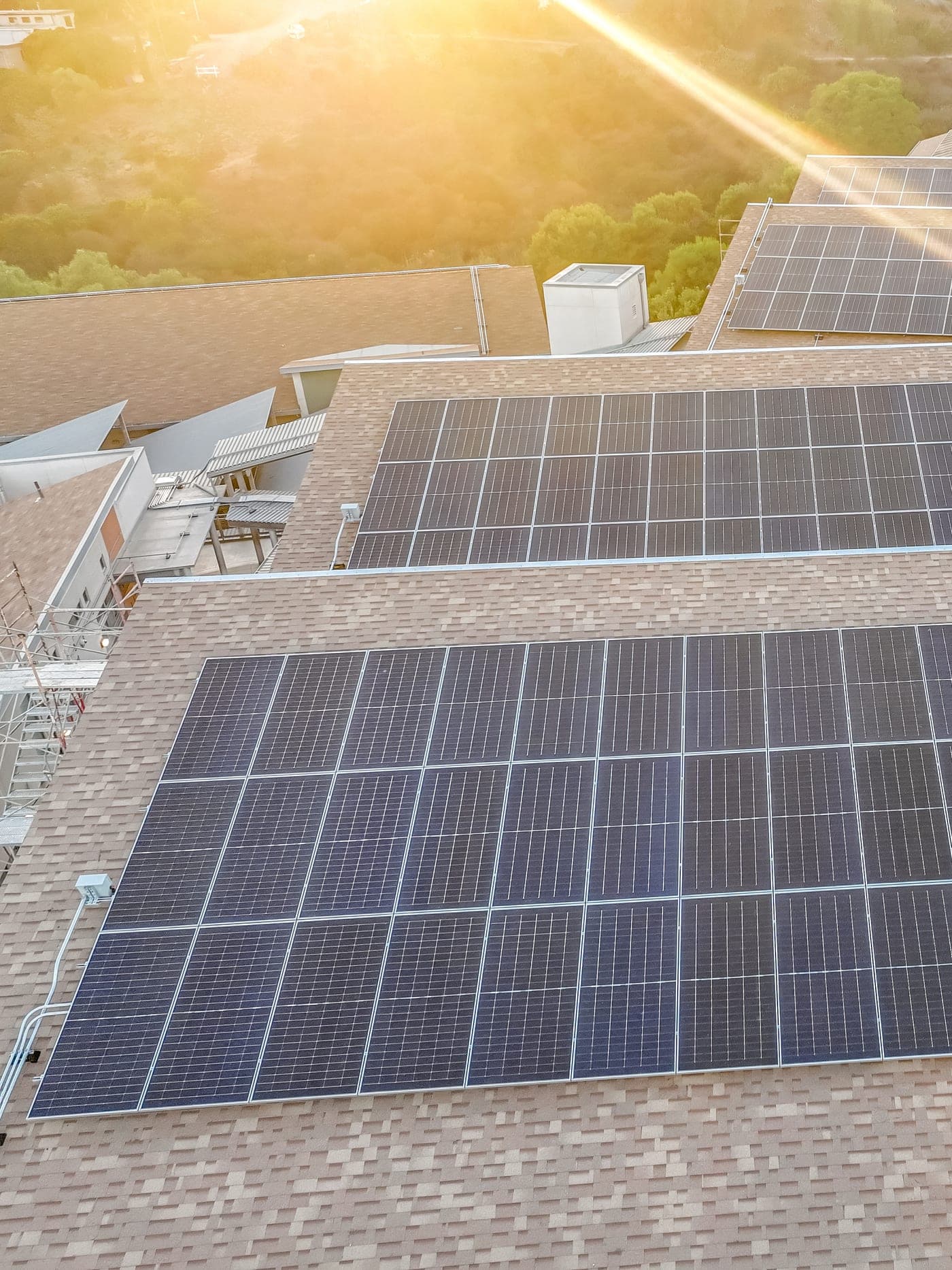 Technician assessing a property for EV charger and solar installation