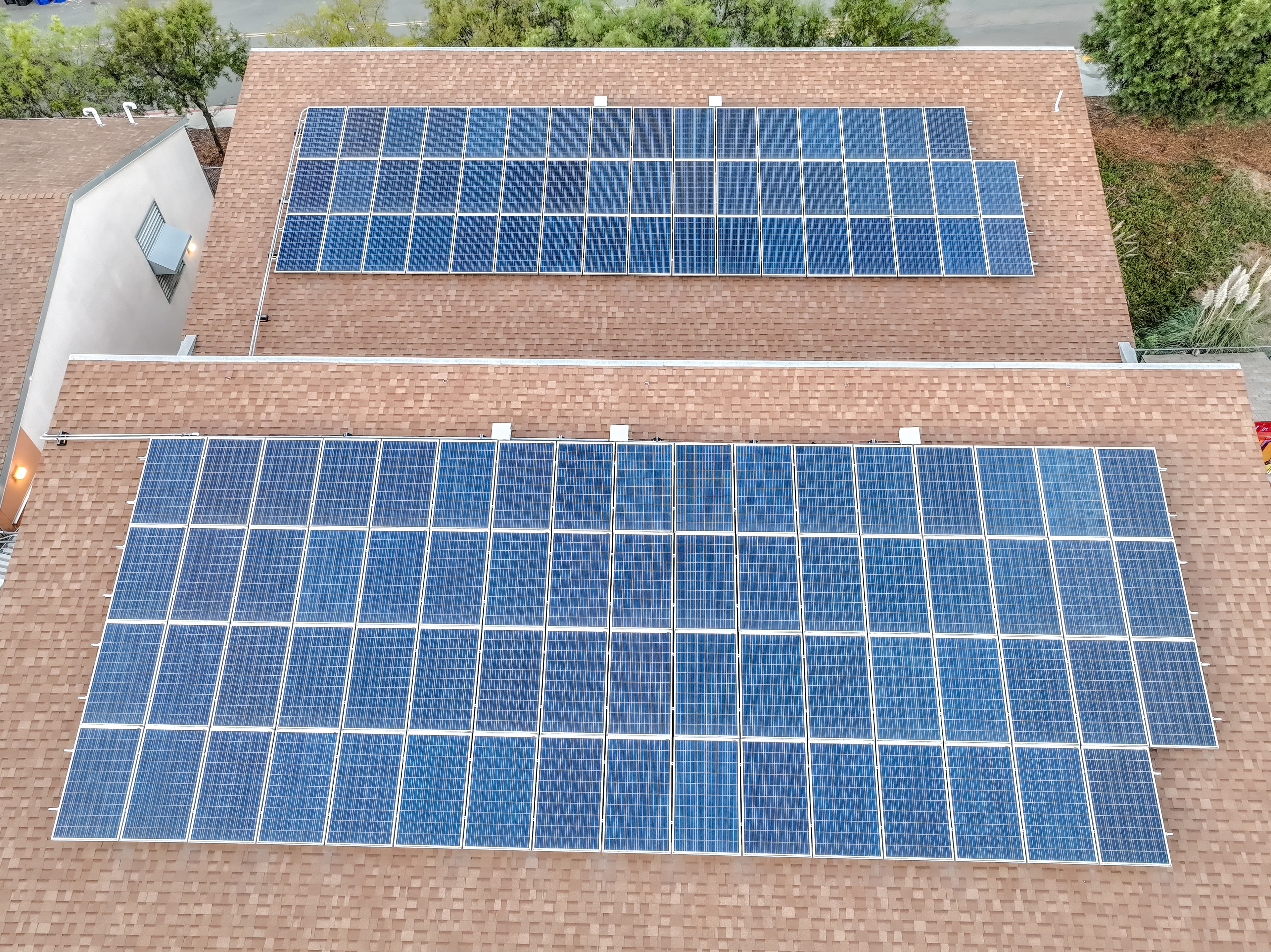 Rooftop solar panels in sunlight