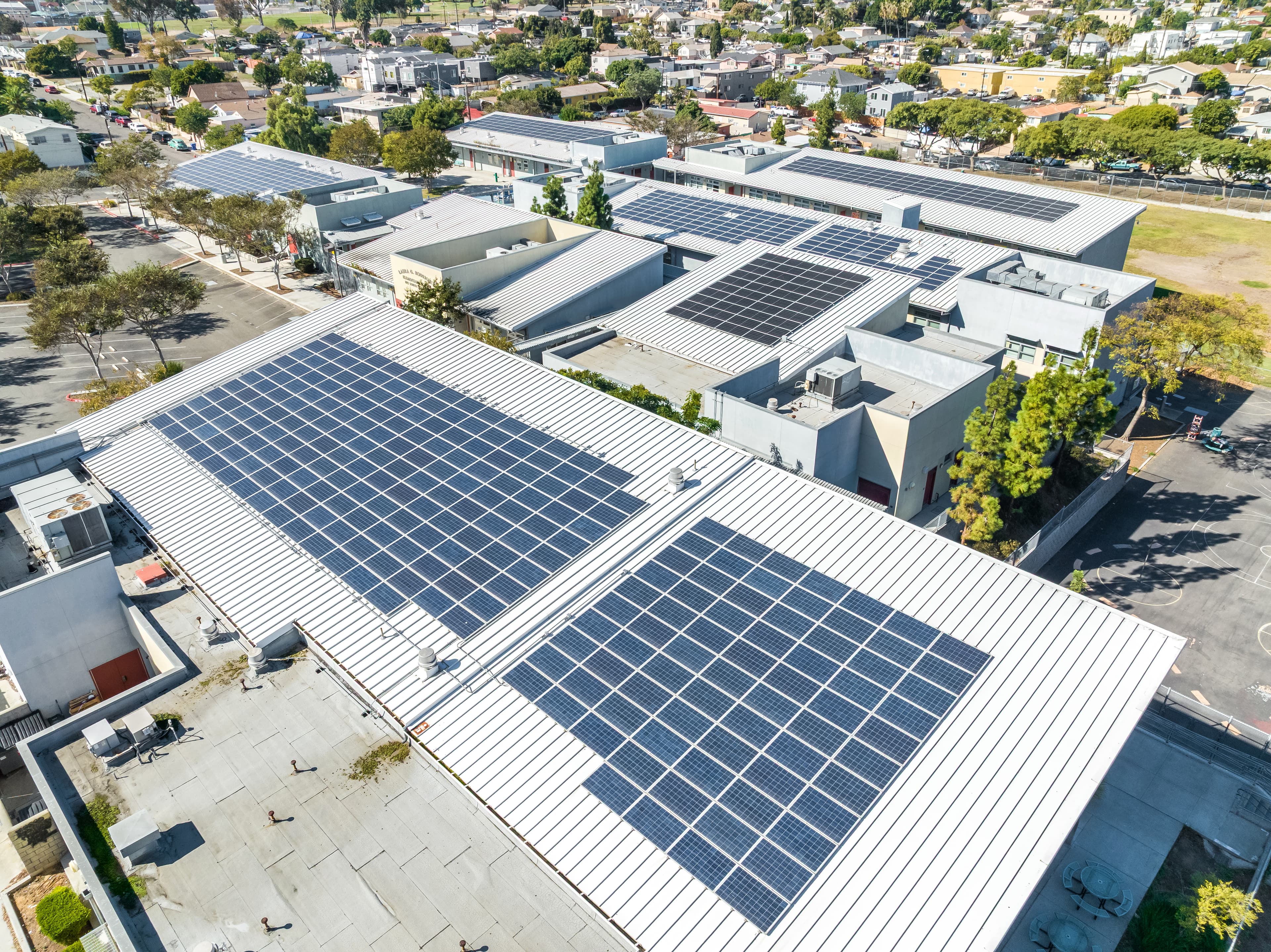 Solar panels reducing common area energy costs on a commercial rooftop