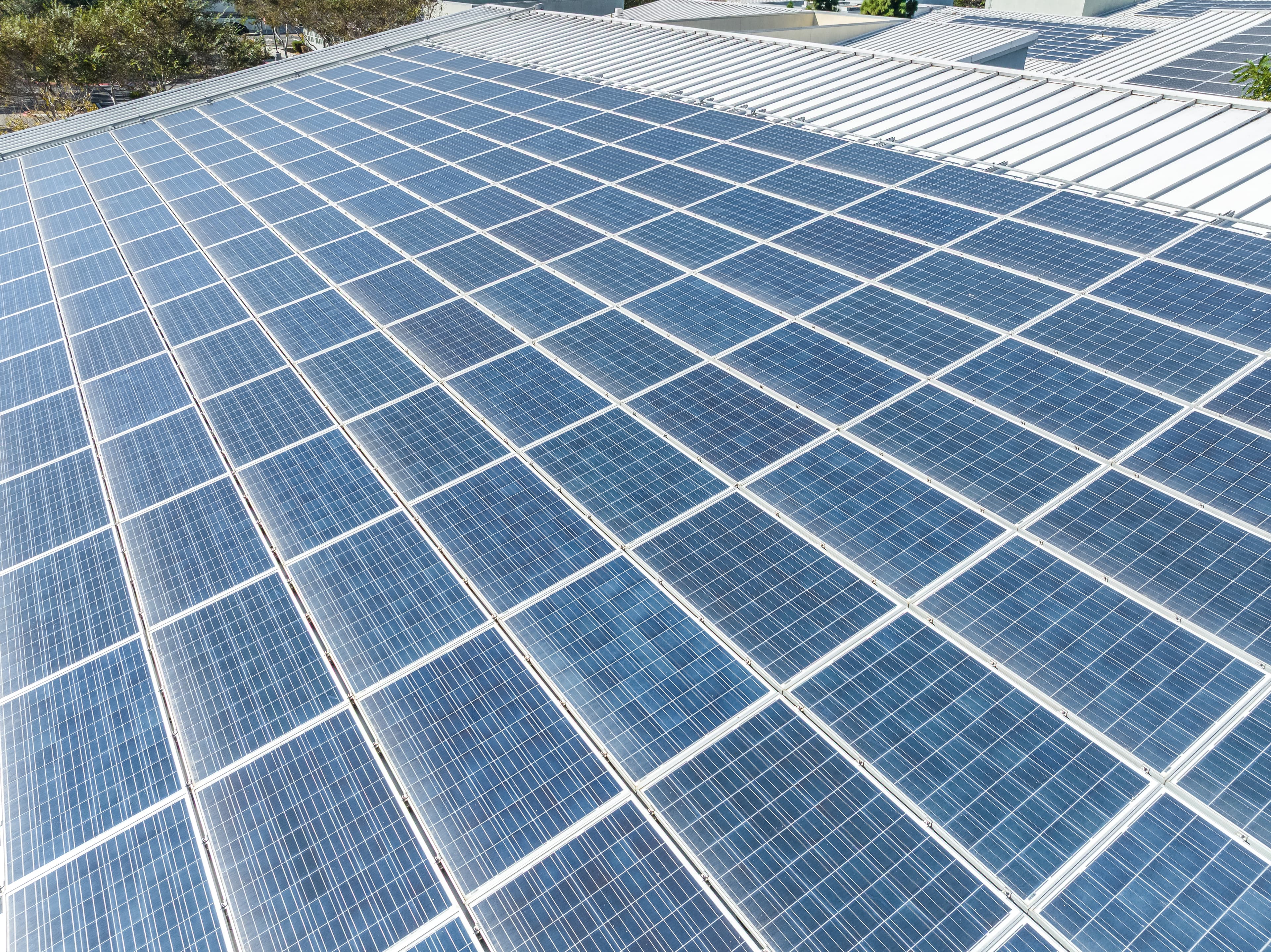 Technician performing solar system maintenance